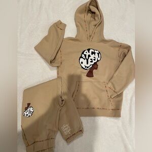 Two piece set of sweat, pants and hoodie size medium